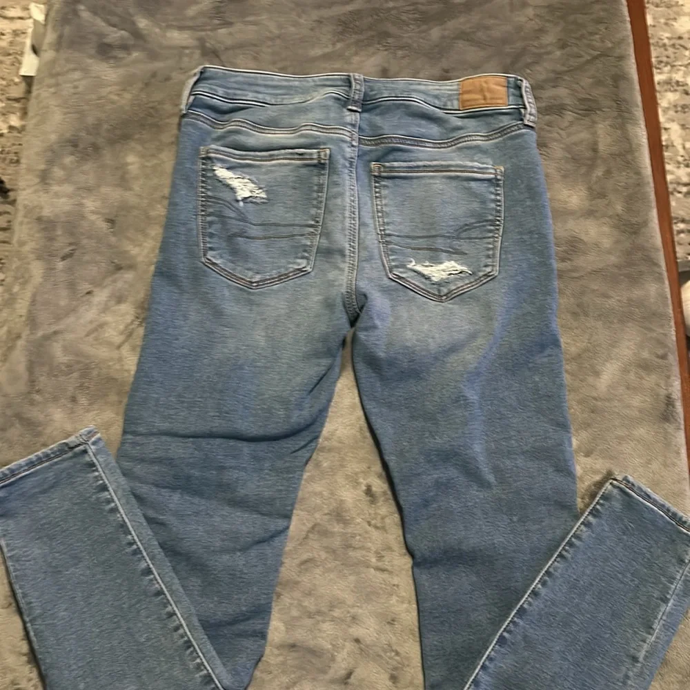 American Eagle Cozy Next Level Stretch Mid Rise Jegging distressed with patching - Picture 3 of 4